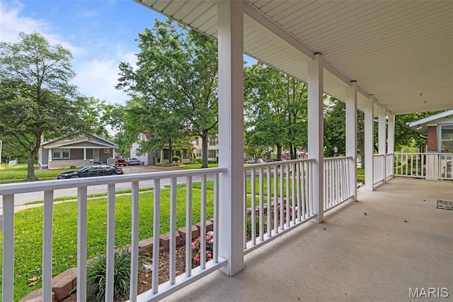 8217 Buchanan Ave, Saint Louis, MO 63114 - covered porch featuring a yard