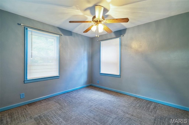 8217 Buchanan Ave, Saint Louis, MO 63114 - carpeted spare room with ceiling fan and baseboards