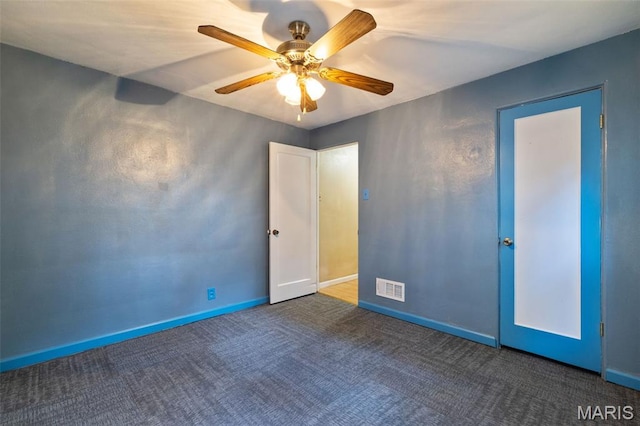 8217 Buchanan Ave, Saint Louis, MO 63114 - unfurnished bedroom with carpet and ceiling fan
