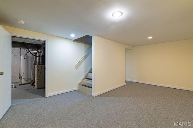 8217 Buchanan Ave, Saint Louis, MO 63114 - finished below grade area with water heater, carpet flooring, stairway, and recessed lighting