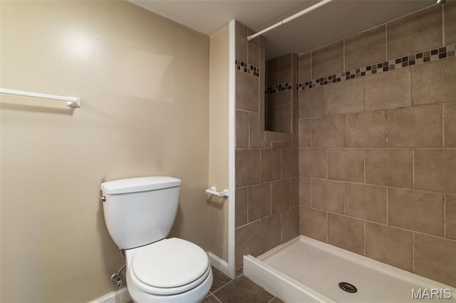 8217 Buchanan Ave, Saint Louis, MO 63114 - full bath featuring a tile shower and tile patterned flooring