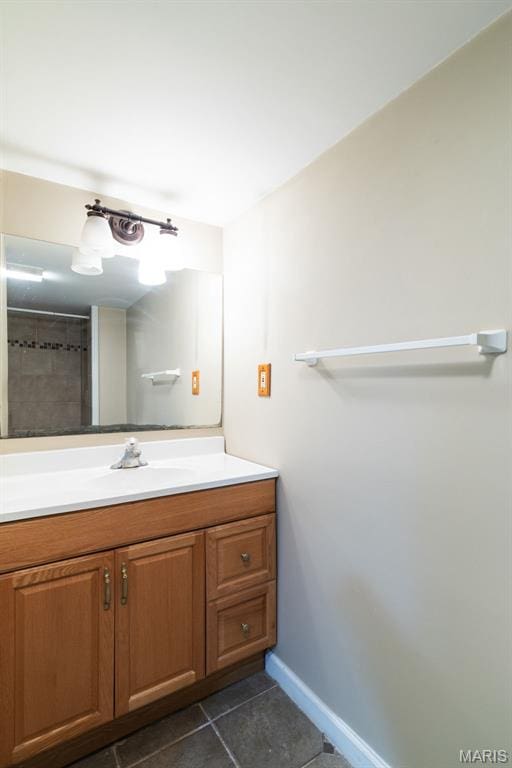 8217 Buchanan Ave, Saint Louis, MO 63114 - bathroom featuring vanity and tile patterned flooring