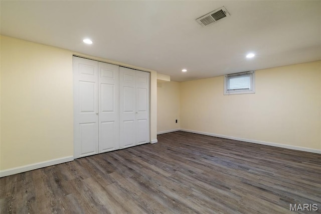 8217 Buchanan Ave, Saint Louis, MO 63114 - unfurnished bedroom with wood finished floors, recessed lighting, and a closet