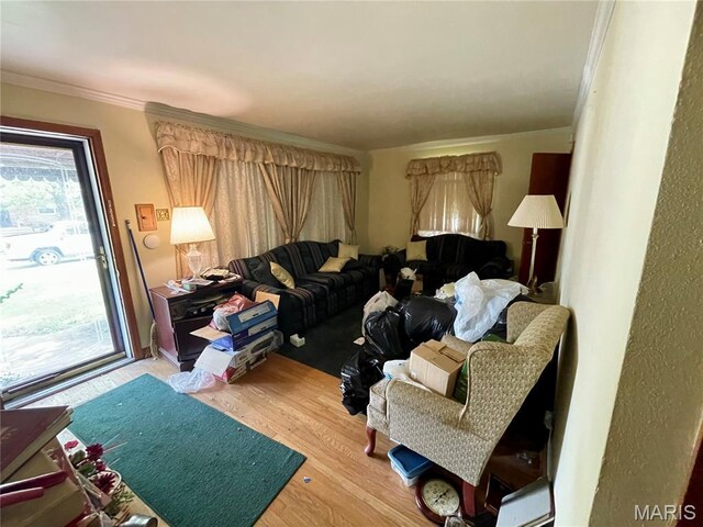 329 Kirk Dr, Ferguson, MO 63135 - living area with wood finished floors and ornamental molding