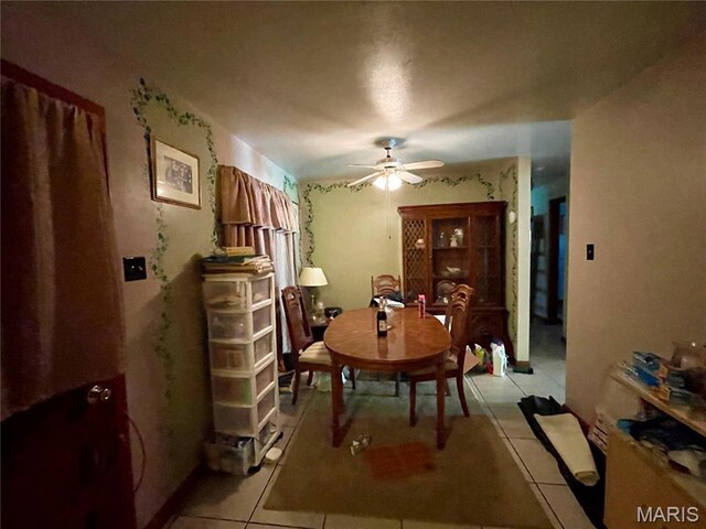 329 Kirk Dr, Ferguson, MO 63135 - dining space with ceiling fan and light tile patterned floors