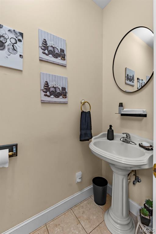 807 Caribou Ct, Cape Girardeau, MO 63701 - bathroom with tile patterned floors and baseboards