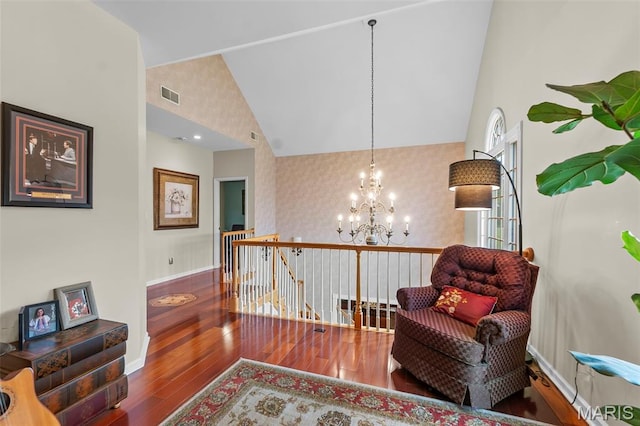 807 Caribou Ct, Cape Girardeau, MO 63701 - sitting room featuring an upstairs landing, a chandelier, wood finished floors, baseboards, and high vaulted ceiling