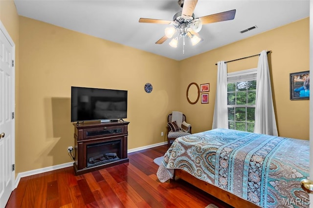 807 Caribou Ct, Cape Girardeau, MO 63701 - bedroom featuring wood finished floors, baseboards, and ceiling fan