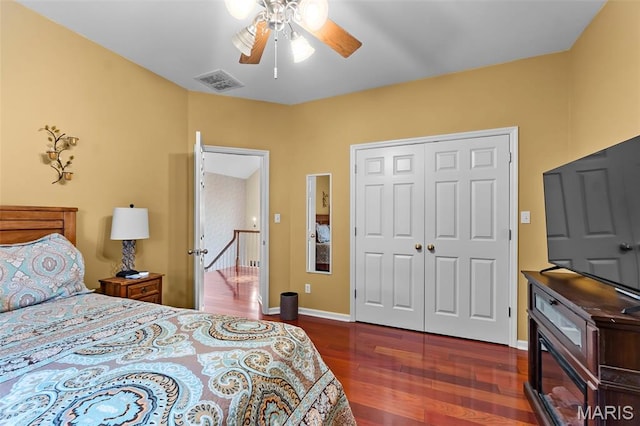 807 Caribou Ct, Cape Girardeau, MO 63701 - bedroom with wood finished floors, a closet, a ceiling fan, and baseboards