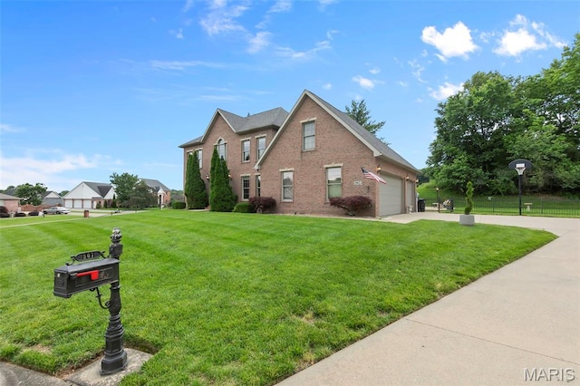 807 Caribou Ct, Cape Girardeau, MO 63701 - traditional-style home with driveway, a front yard, brick siding, and a garage