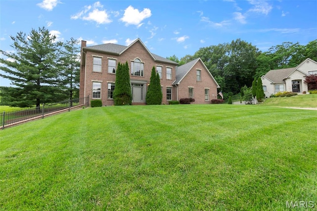 807 Caribou Ct, Cape Girardeau, MO 63701 - view of front of home with a chimney and brick siding