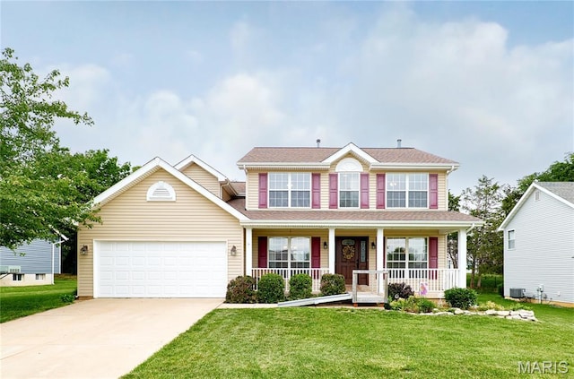 2052 Peine Frst, Wentzville, MO 63385 - view of front of property featuring covered porch, driveway, a garage, a front yard, and roof with shingles
