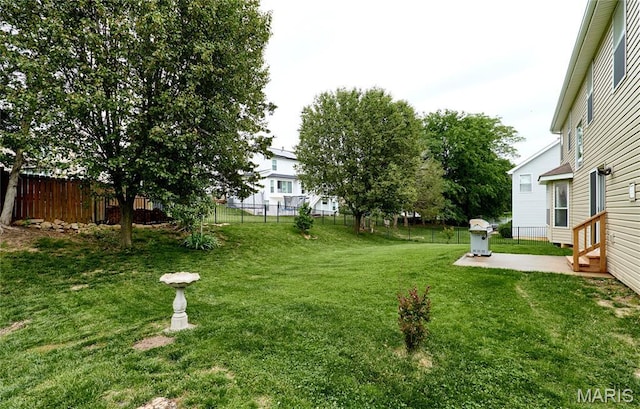 2052 Peine Frst, Wentzville, MO 63385 - fenced backyard featuring a patio and entry steps
