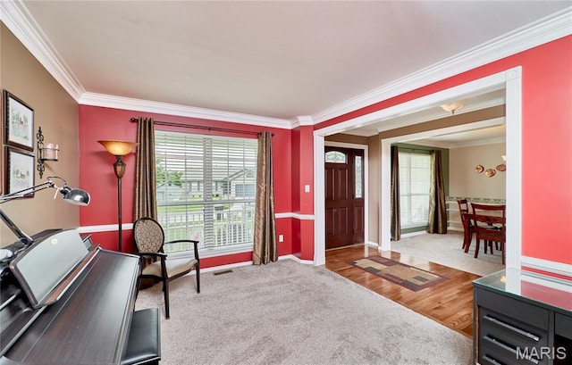 2052 Peine Frst, Wentzville, MO 63385 - carpeted foyer entrance with ornamental molding and wood finished floors