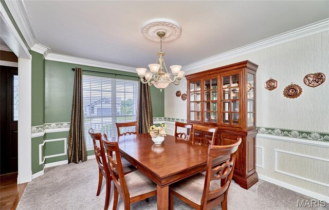 2052 Peine Frst, Wentzville, MO 63385 - dining area with a chandelier, crown molding, a wainscoted wall, and light carpet