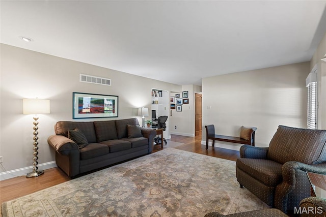 113 Christine Cay Ct, Saint Charles, MO 63304 - living area with baseboards and wood finished floors