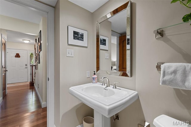 113 Christine Cay Ct, Saint Charles, MO 63304 - bathroom with hardwood / wood-style flooring, toilet, and baseboards