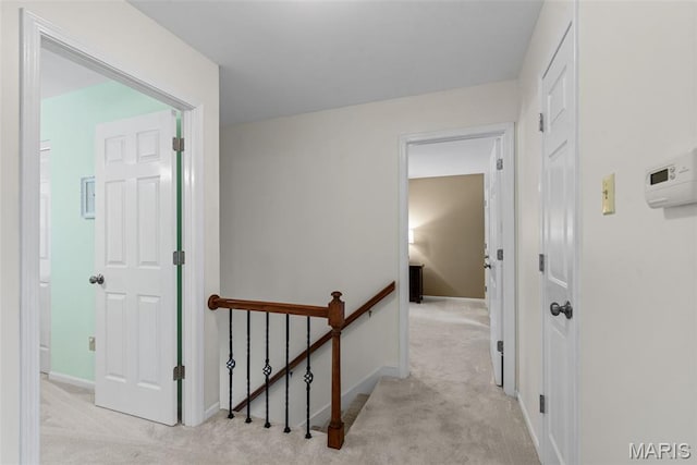 113 Christine Cay Ct, Saint Charles, MO 63304 - hall featuring an upstairs landing, carpet, and baseboards