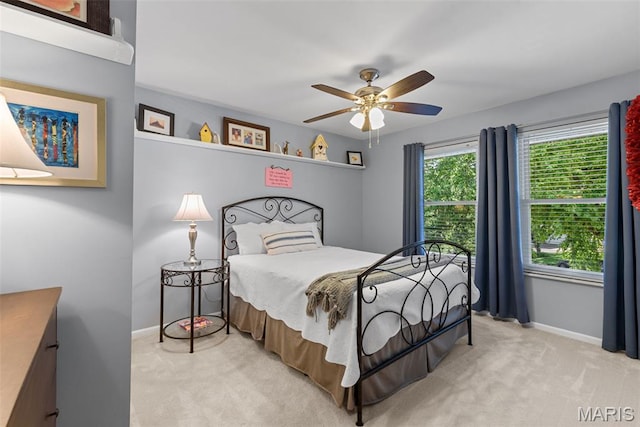 113 Christine Cay Ct, Saint Charles, MO 63304 - carpeted bedroom with baseboards and a ceiling fan