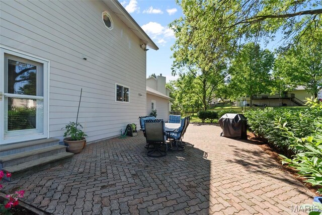 113 Christine Cay Ct, Saint Charles, MO 63304 - view of patio featuring outdoor dining space and grilling area