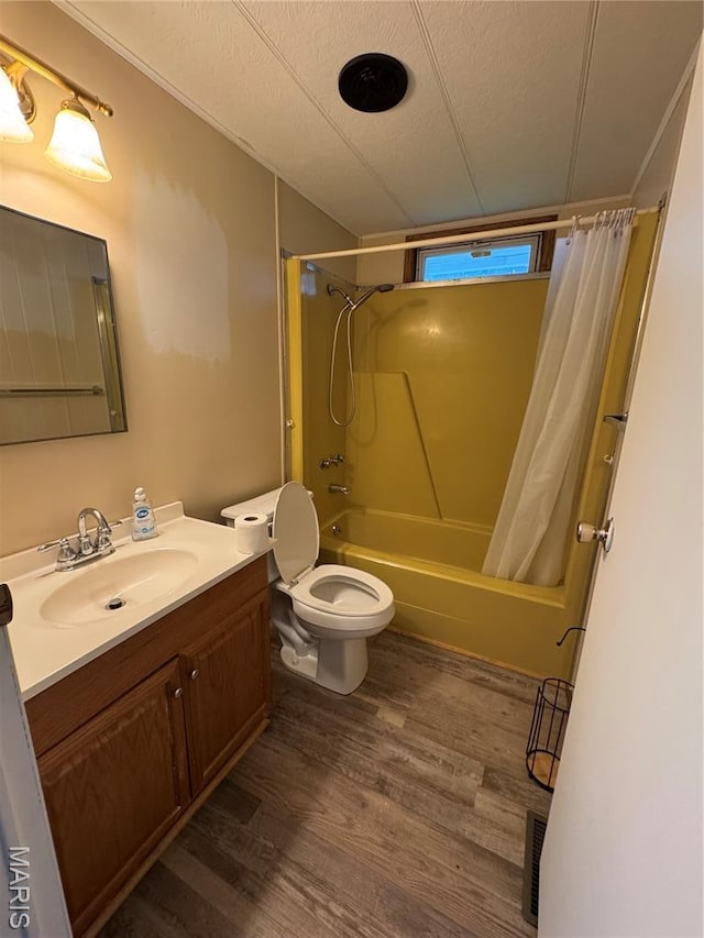 516 S 12th St, Bowling Green, MO 63334 - full bathroom featuring vanity, shower / bath combination with curtain, toilet, and wood finished floors