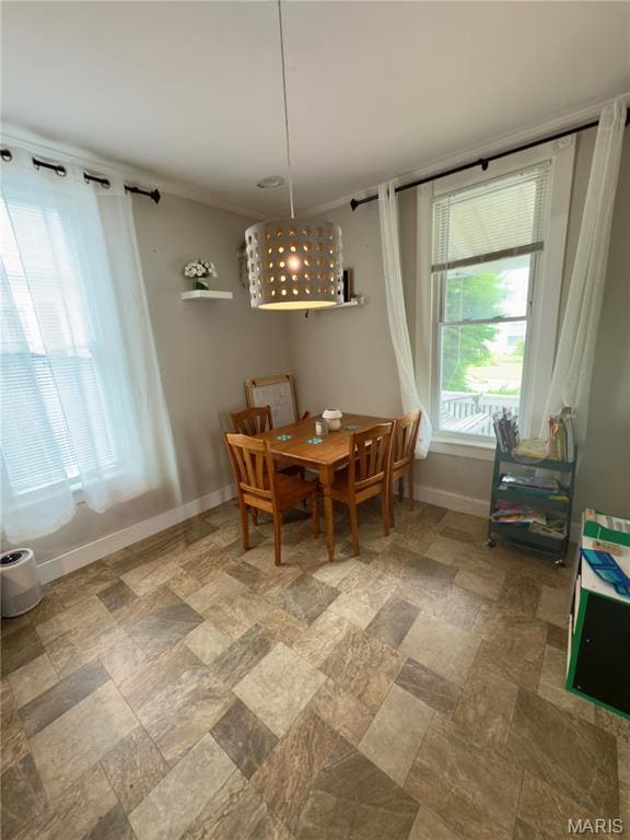 518 Randle St, Edwardsville, IL 62025 - dining area with baseboards and stone finish flooring