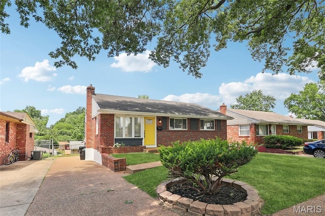 1525 79th St, Saint Louis, MO 63130 - single story home featuring a chimney, brick siding, and driveway