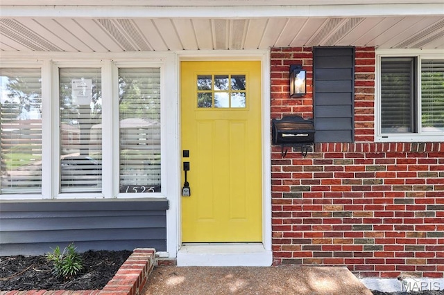 1525 79th St, Saint Louis, MO 63130 - property entrance featuring brick siding