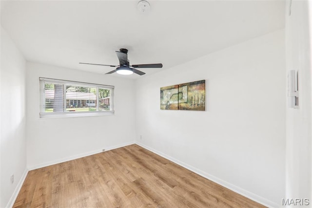 1525 79th St, Saint Louis, MO 63130 - spare room with light wood finished floors, a smoke detector, and a ceiling fan
