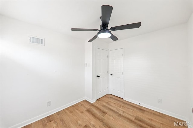 1525 79th St, Saint Louis, MO 63130 - spare room with light wood-type flooring and ceiling fan