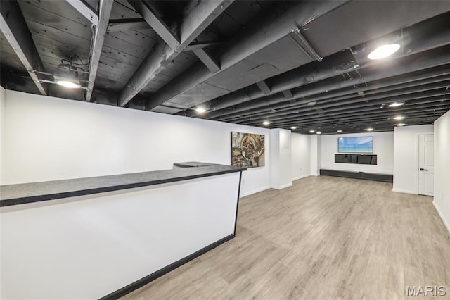 1525 79th St, Saint Louis, MO 63130 - below grade area featuring wood finished floors and baseboards