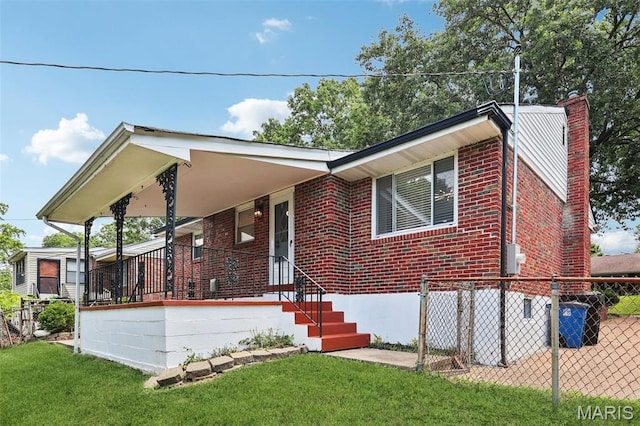 1525 79th St, Saint Louis, MO 63130 - view of front of home with brick siding and a chimney