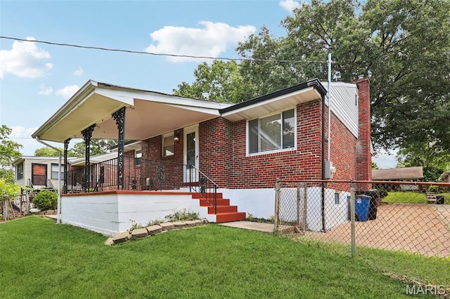 1525 79th St, Saint Louis, MO 63130 - view of front facade featuring a chimney, brick siding, and covered porch