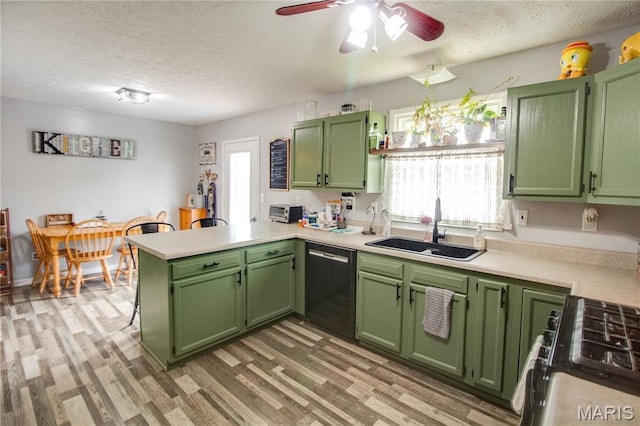 906 E Fairgrounds Ave, Jerseyville, IL 62052 - kitchen featuring black dishwasher, a sink, green cabinetry, and a textured ceiling