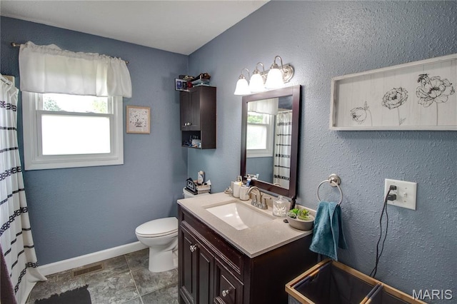 906 E Fairgrounds Ave, Jerseyville, IL 62052 - bathroom featuring vanity, toilet, baseboards, and a shower with curtain