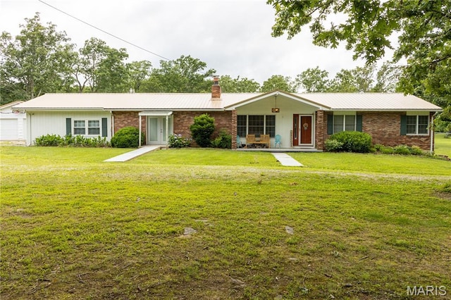 465 County Road 5120, Salem, MO 65560 - single story home featuring a chimney, a front lawn, and brick siding