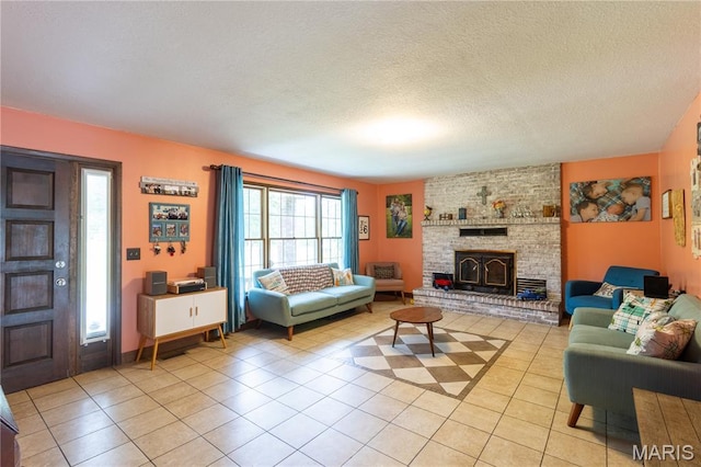 465 County Road 5120, Salem, MO 65560 - living room with light tile patterned floors, a brick fireplace, and a textured ceiling