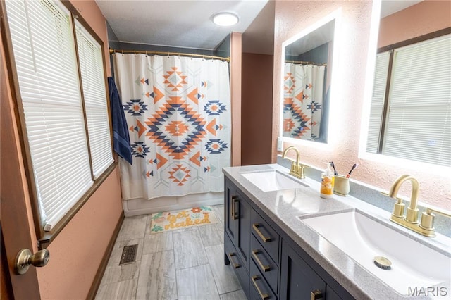465 County Road 5120, Salem, MO 65560 - bathroom with double vanity and a shower with shower curtain