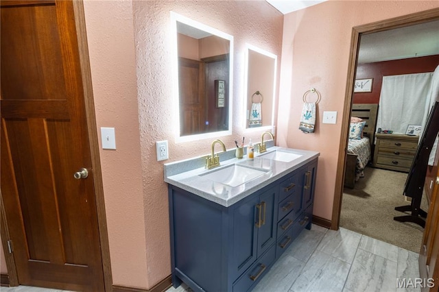 465 County Road 5120, Salem, MO 65560 - bathroom with a textured wall, connected bathroom, and double vanity