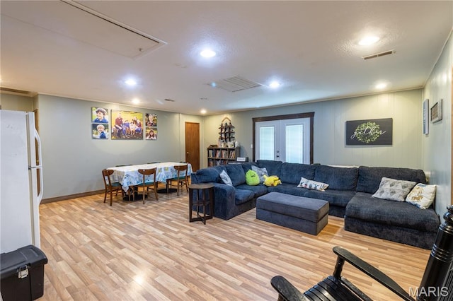 465 County Road 5120, Salem, MO 65560 - living room with attic access, light wood-style floors, recessed lighting, and french doors