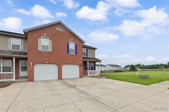2024 Camrose Green St, Belleville, IL 62220 - view of front of property featuring concrete driveway, a front yard, an attached garage, and brick siding