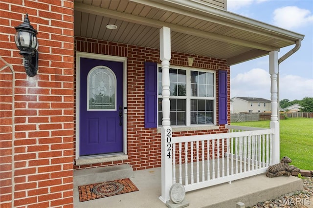 2024 Camrose Green St, Belleville, IL 62220 - doorway to property featuring covered porch and brick siding