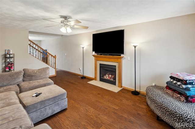 2024 Camrose Green St, Belleville, IL 62220 - living room featuring baseboards, wood finished floors, stairway, a fireplace with flush hearth, and ceiling fan