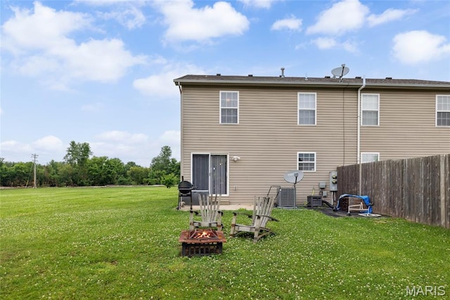 2024 Camrose Green St, Belleville, IL 62220 - rear view of house featuring an outdoor fire pit and central AC unit