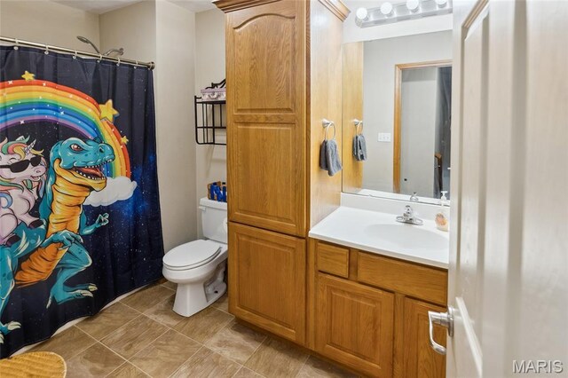 2024 Camrose Green St, Belleville, IL 62220 - full bath featuring toilet, vanity, tile patterned flooring, and curtained shower