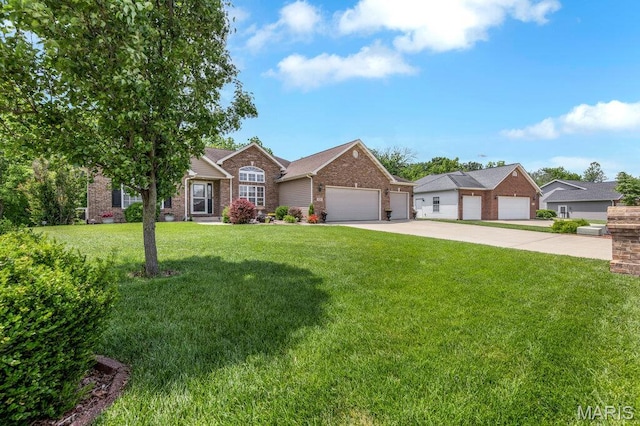 1020 Oak Creek Ln, Waterloo, IL 62298 - view of front of property with brick siding, concrete driveway, a front lawn, and a garage