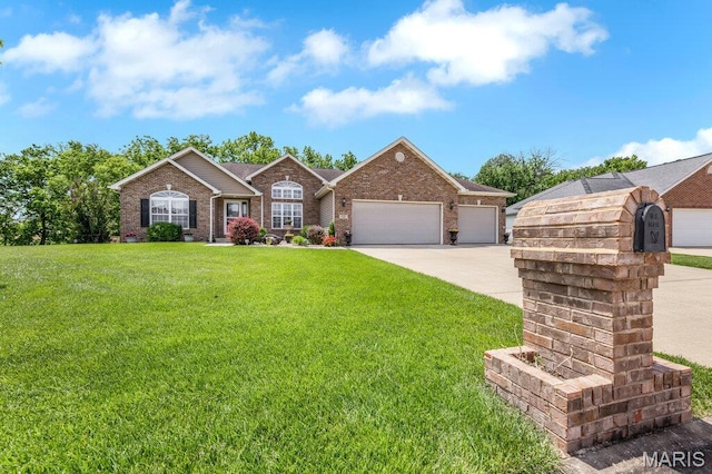 1020 Oak Creek Ln, Waterloo, IL 62298 - single story home featuring brick siding, a front lawn, a garage, and concrete driveway