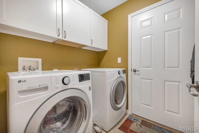 1020 Oak Creek Ln, Waterloo, IL 62298 - laundry room featuring cabinet space and washer and clothes dryer