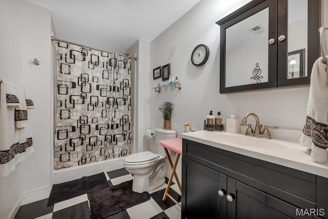 1020 Oak Creek Ln, Waterloo, IL 62298 - bathroom featuring toilet, vanity, a shower with curtain, and tile patterned floors