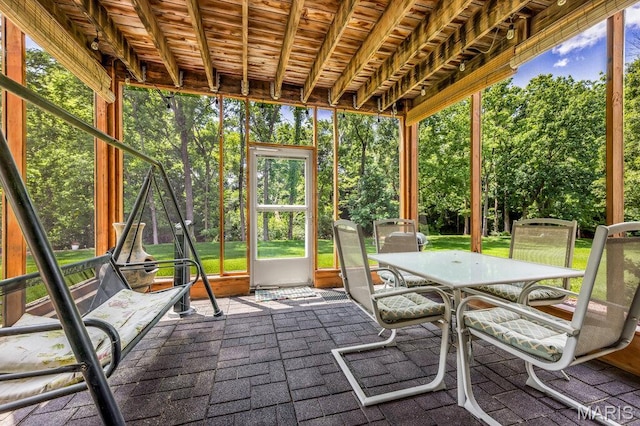 1020 Oak Creek Ln, Waterloo, IL 62298 - unfurnished sunroom featuring outdoor dining area and view of wooded area